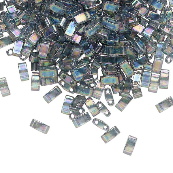 Seed bead, TILA®, glass, pkg/250g, 5x2.3mm half tila rectangle, translucent rainbow luster dark grey, (HTL-2440D). image number 0