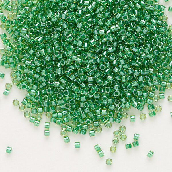 Seed bead, Delica®, glass, pkg/7.5g, #11 round, translucent green-lined luster chartreuse (DB-0916). image number 0