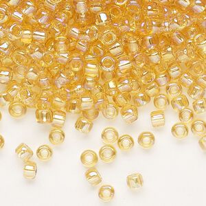 Seed bead, Dyna-Mites™, glass, transparent rainbow amber yellow, #6 round. Sold per 40-gram pkg.