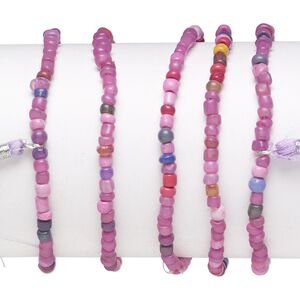 Bracelet mix, stretch, glass, mixed pinks and purples, #6 round with 45mm tassel, 7-1/2 inches. Sold per pkg of 5.