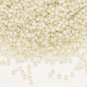 Seed bead, TOHO BEADS®, glass, pkg/250g, #11 round, transparent silver-lined milky light jonquil (TR-11-PF2125).