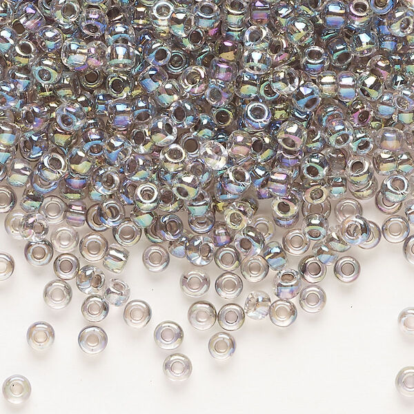 Seed bead, Dyna-Mites™, glass, translucent inside color rainbow peacock, #8 round. Sold per 40-gram pkg. image number 0