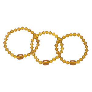 Bracelet, stretch, glass, golden yellow, 7-8 inches wearable length. Sold per pkg of 3.