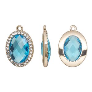 Drop, glass / glass rhinestone / gold-finished "pewter" (zinc-based alloy), clear and transparent sapphire blue, 23.5x19mm single-sided oval. Sold per pkg of 2.