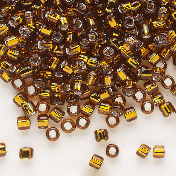 Seed bead, Dyna-Mites™, glass, silver-lined translucent root beer, #6 round with square hole. Sold per 1/2 kilogram pkg. image number 0