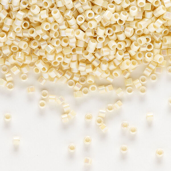 Seed bead, Delica®, glass, pkg/7.5g, #10 round, opaque rainbow cream (DBM-0157). image number 0