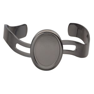 Bracelet, cuff, gunmetal-plated brass and "pewter" (zinc-based alloy), 63x30mm with wave design and 25x18mm oval setting, adjustable. Sold individually.