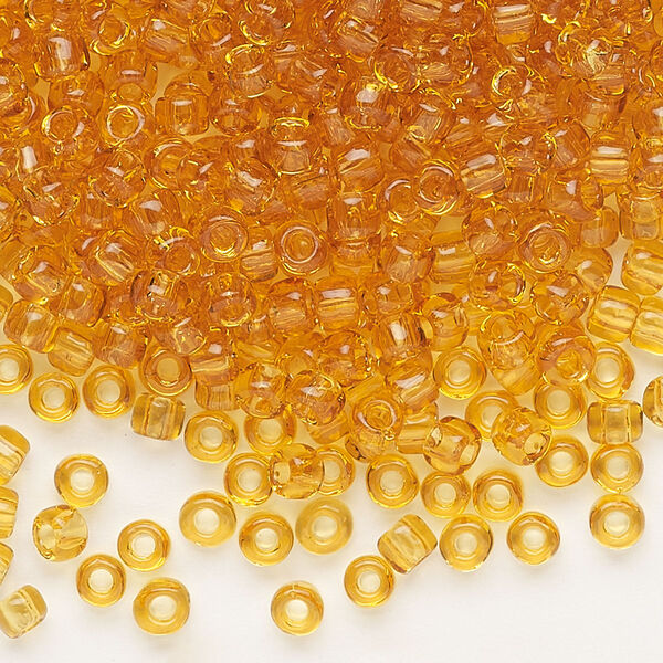 Seed bead, Dyna-Mites™, glass, transparent light amber yellow, #6 round. Sold per 40-gram pkg. image number 0