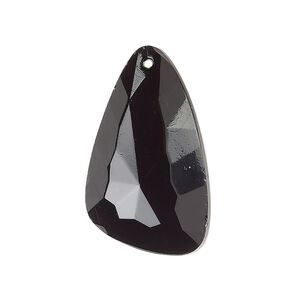 Focal, vintage Czech glass, opaque black, 31mm faceted freeform with flat back. Sold individually.