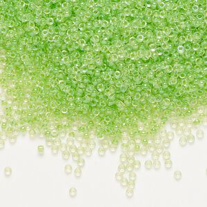 Seed bead, Miyuki, glass, pkg/35g, #15 rocaille, translucent light green-lined luster crystal clear (RR-228).