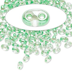 Seed bead, Preciosa Twin™ Czech glass, pkg/10g, 5x2.5mm oval, transparent light green terra color-lined clear, (38656).