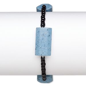 Bracelet, stretch, glass, opaque black and blue, 4x3mm-5x4mm rondelle and 24x14mm-25x16mm faceted puffed rectangle, 7 inches. Sold individually.