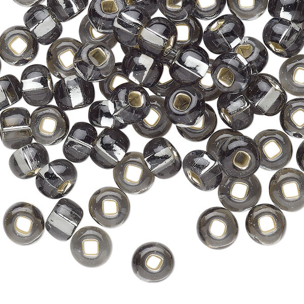 Seed bead, Preciosa Ornela Czech glass, pkg/50g, #2 rocaille, transparent silver-lined grey, (47010). image number 0
