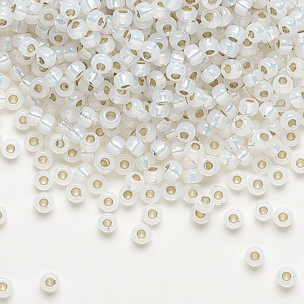 Seed bead, Miyuki, glass, pkg/50g, #8 rocaille, translucent silver-lined opal (RR-551). image number 0