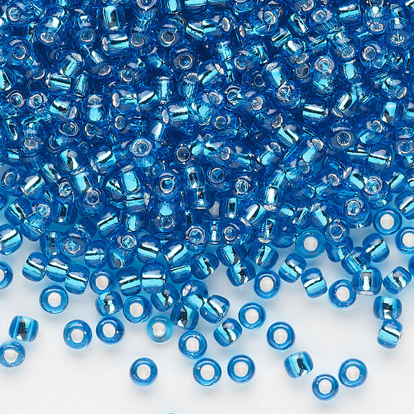 Seed bead, Dyna-Mites™, glass, silver-lined translucent turquoise blue, #8 round. Sold per 1/2 kilogram pkg. image number 0