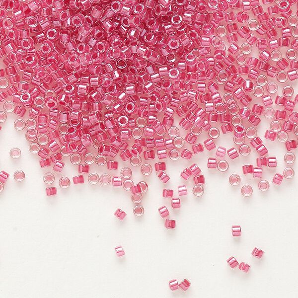 Seed bead, Delica®, glass, pkg/7.5g, #11 round, translucent rose-lined luster crystal clear (DB-0914). image number 0