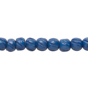 Bead, bone (dyed), blue and black, 6.5x5.5mm corrugated barrel. Sold per 15-1/2" to 16" strand.