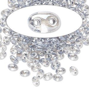 Seed bead, Preciosa Twin™ Czech glass, pkg/10g, 5x2.5mm oval, transparent light grey terra color-lined clear, (38642).