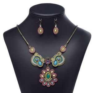 Necklace and earring set, acrylic rhinestone / acrylic / glass rhinestone / enamel / antique gold-finished brass / steel / "pewter" (zinc-based alloy), multicolored, 2-1/2 inch dangle with teardrop, 22-inch necklace with 3-inch extender chain and lobster claw clasp, 32mm earrings with fishhook ear wire. Sold per set.