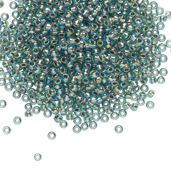 Seed bead, TOHO BEADS®, glass, pkg/7.5g, #11 round, translucent gold-lined rainbow aqua (TR-11-995). image number 0