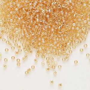 Seed bead, Delica®, glass, pkg/7.5g, #11 round, translucent luster light topaz (DB-0099).