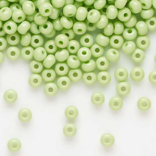 Seed bead, Preciosa Ornela, glass, opaque pale green, #6 rocaille. Sold per 50-gram pkg. image number 0