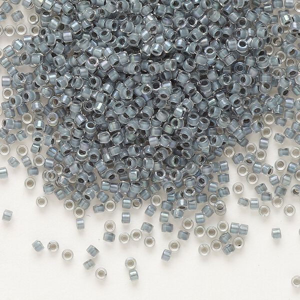 Seed bead, Delica®, glass, pkg/7.5g, #11 round, translucent grey-lined luster crystal clear (DB-0081). image number 0