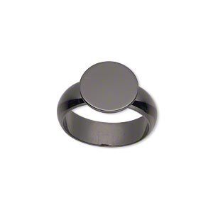 Ring, gunmetal-plated brass, 6mm wide, 12mm round flat pad setting, size 7. Sold individually.
