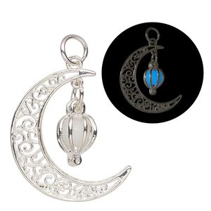 Focal, silver-finished "pewter" (zinc-based alloy) and polystyrene, white glow-in-the-dark, 38x30mm moon. Sold individually.