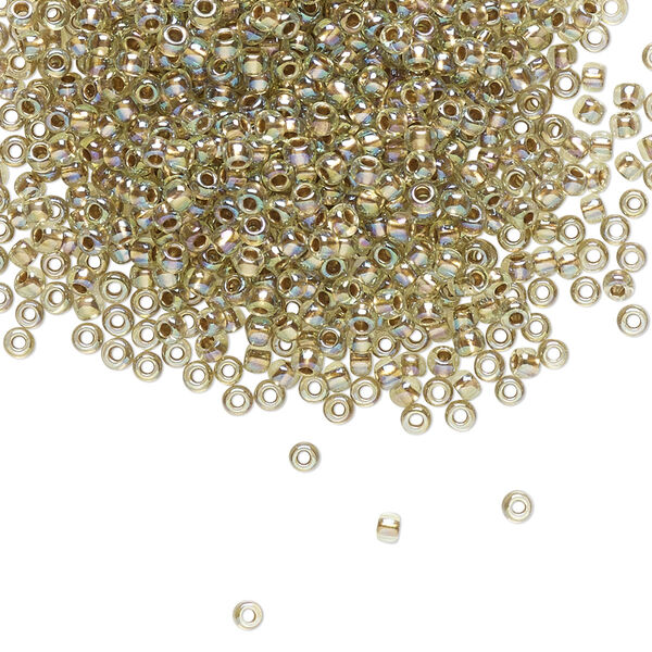 Seed bead, TOHO BEADS®, glass, pkg/7.5g, #11 round, translucent gold-lined rainbow light jonquil (TR-11-998). image number 0