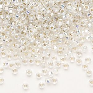 Seed bead, Preciosa Ornela Czech glass, pkg/500g, #8 rocaille, translucent silver-lined rainbow clear, (78109).