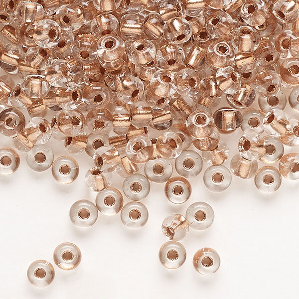 Seed bead, Preciosa Ornela Czech glass, pkg/500g, #6 rocaille, transparent copper-lined clear, (68105). image number 0