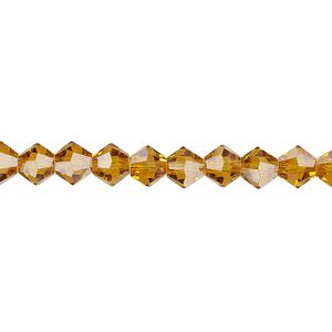 Bead 1pk transparent gold, Celestial Crystal® 6mm bicone 15.5-16 inch