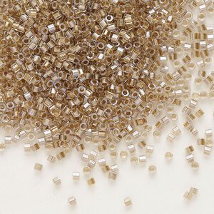 Seed bead, Delica®, glass, pkg/50g, #11 cut, translucent beige-lined luster crystal clear (DBC-0907).