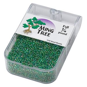 Seed bead, Ming Tree™, glass, pkg/1/4 pound, #11 round, translucent rainbow emerald green.