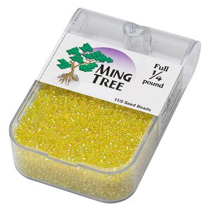 Seed bead, Ming Tree™, glass, pkg/1/4 pound, #11 round, translucent rainbow yellow.