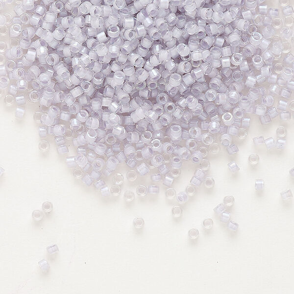 Seed bead, Delica®, glass, pkg/7.5g, #11 round, translucent pale violet-lined luster crystal clear (DB-0080). image number 0