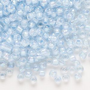 Seed bead, Dyna-Mites™, glass, transparent rainbow inside color ice blue, #6 round. Sold per 1/2 kilogram pkg.