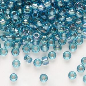 Seed bead, Miyuki, glass, pkg/250g, #6 rocaille, translucent dusk-lined luster crystal clear (RR-1824).