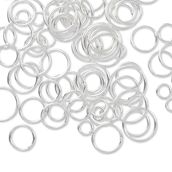 Jump ring mix, sterling silver-filled, 4-10mm soldered round, 2.5-8.8mm inside diameter, 22 gauge. Sold per 5-gram pkg, approximately 75-85 jump rings. image number 0