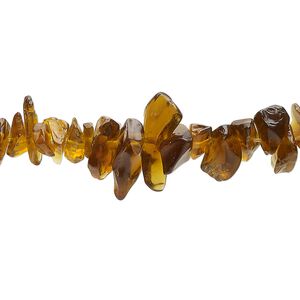 Bead, glass, opaque and translucent brown, small to large chip with 0.6-0.8mm hole. Sold per 34-inch strand, approximately 310 beads.