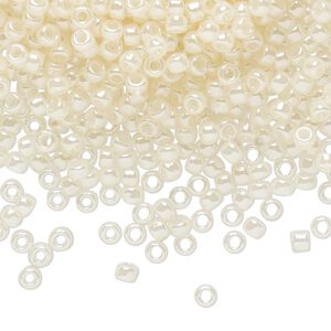 Seed bead, TOHO BEADS®, glass, pkg/7.5g, #8 round, opaque ceylon light ivory (TR-08-147).