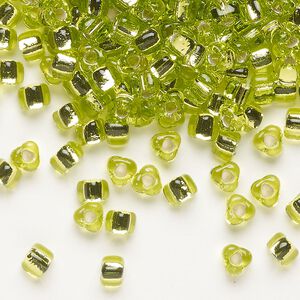 Seed bead, Miyuki, glass, silver-lined translucent lime, (TR1801), #5 triangle. Sold per 25-gram pkg.