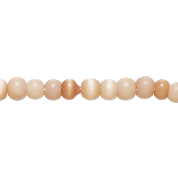 Bead, cat's eye glass (fiber optic glass), light to dark peach, 4-6mm irregular round. Sold per 14-inch strand, approximately 90 beads. image number 0