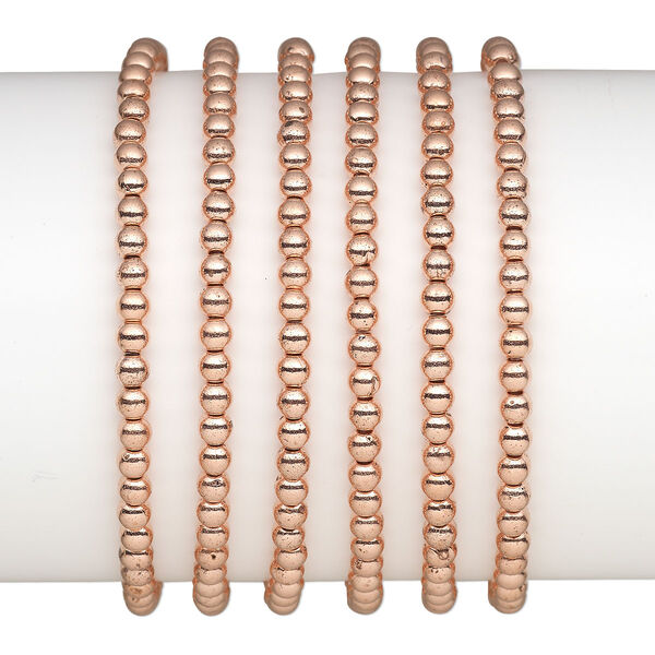 Bracelet, stretch, copper-coated plastic, 4mm round, 7 inches. Sold per pkg of 6. image number 0