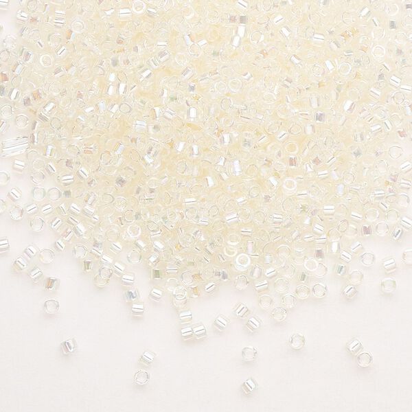 Seed bead, Delica®, glass, pkg/7.5g, #11 round, translucent rainbow glazed luster crystal ivory (DB-0109). image number 0