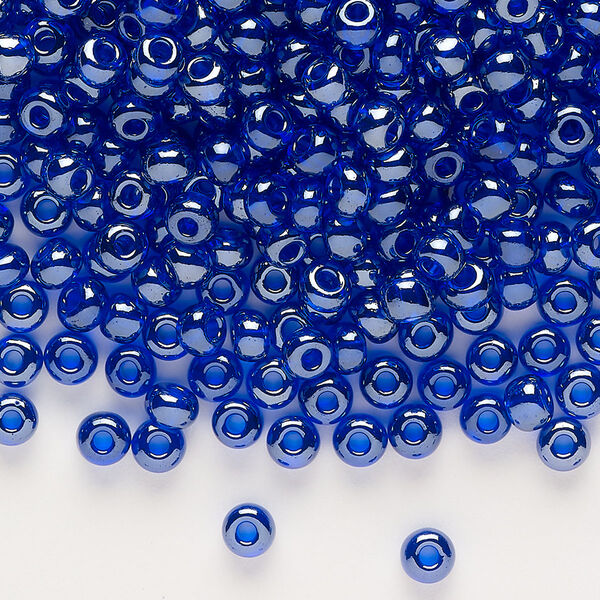 Seed bead, glass, pkg/50g, #6 rocaille, opaque luster cobalt blue. image number 0