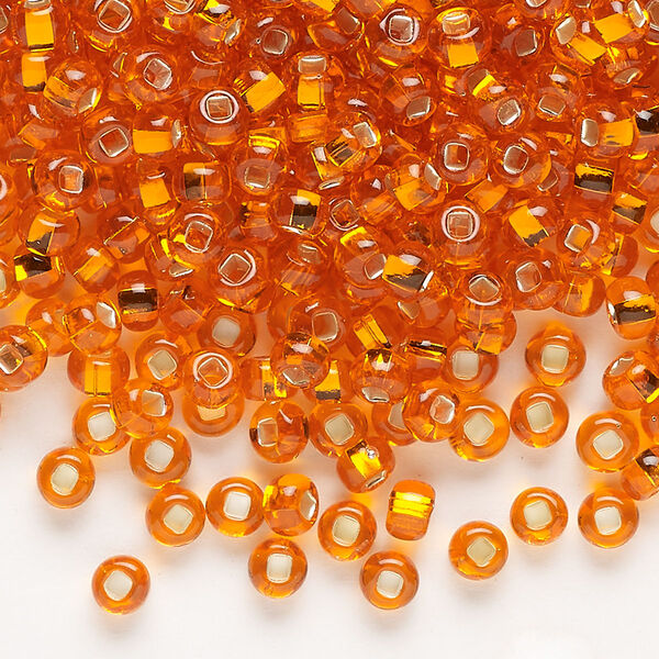 Seed bead, Preciosa Ornela Czech glass, pkg/500g, #6 rocaille, transparent silver-lined dark orange, (97030). image number 0