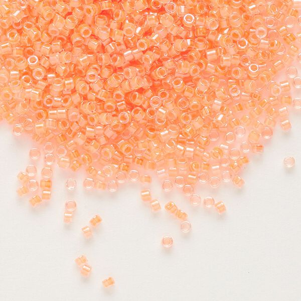 Seed bead, Delica®, glass, pkg/7.5g, #11 round, translucent luminous inside dyed color creamsicle (DB-2033). image number 0