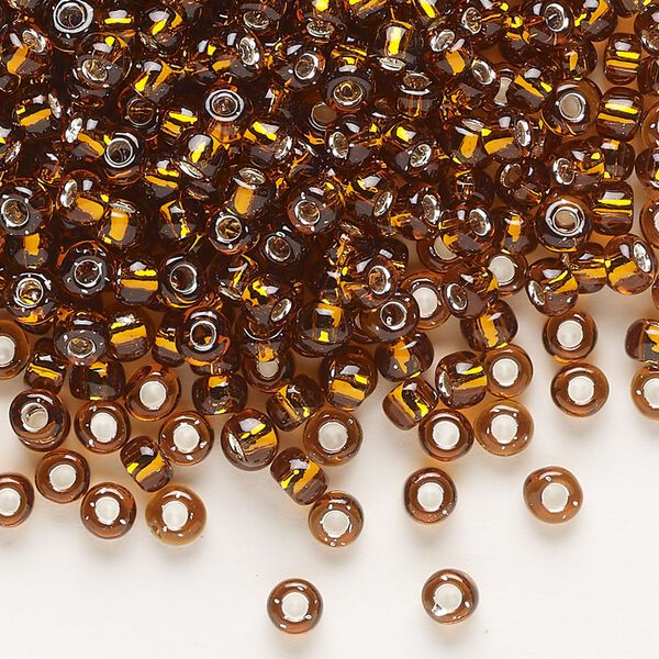 Seed bead, Dyna-Mites™, glass, transparent silver-lined root beer, #6 round. Sold per 40-gram pkg. image number 0